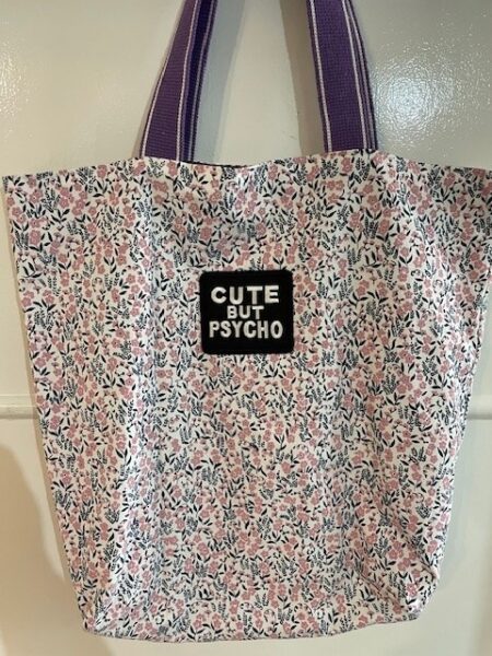 'Cute but psycho' floral fabric shoulder tote bag