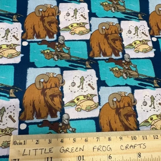Star Wars - Grogu with Mammoth Mandalorian design cotton fabric x 1m